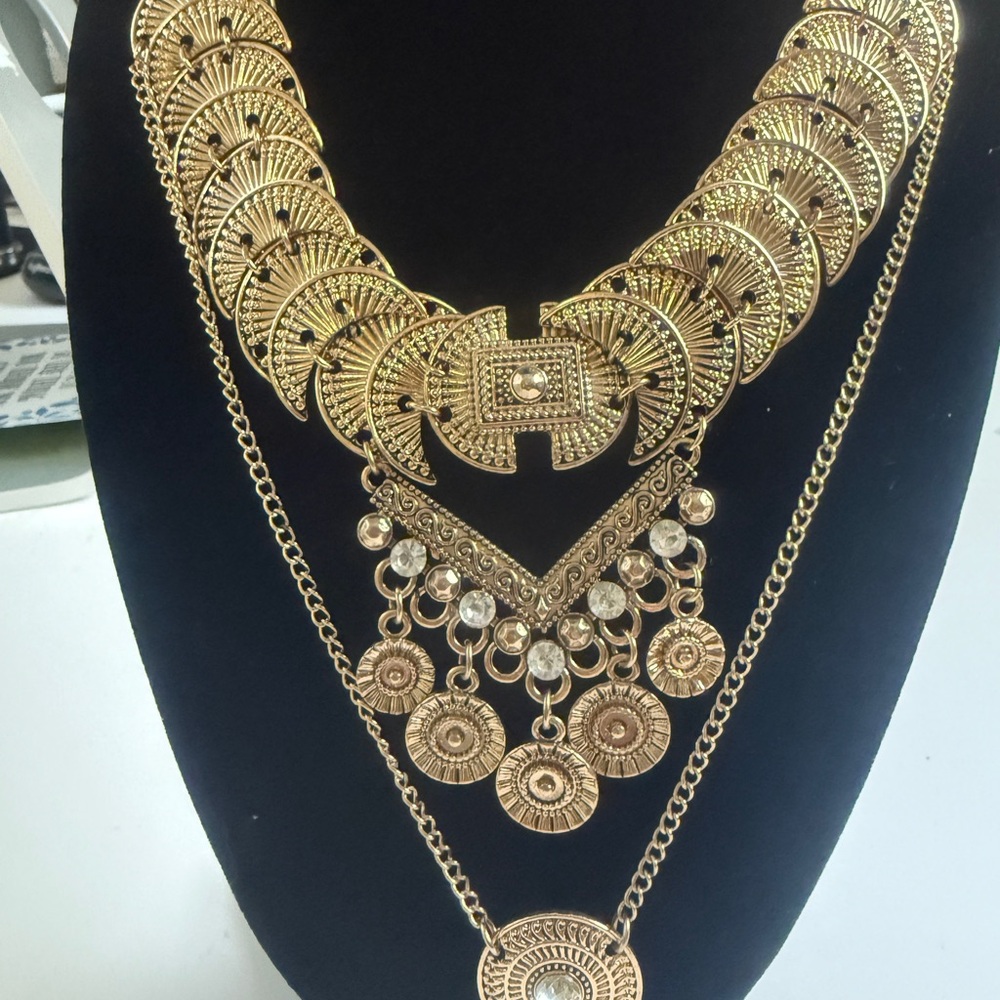 Luxurious Gold Layered Necklaces with Intricate Designs